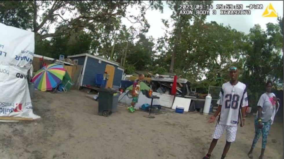 Pictures from police body camera footage shows the living conditions in the backyard of the...