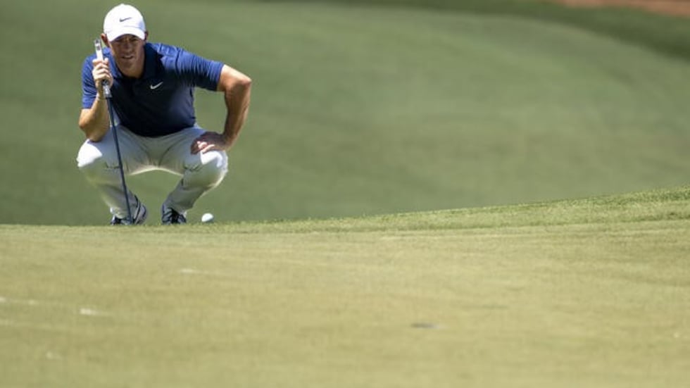 Rory McIlroy of Northern Ireland putts on the No. 7 green during the final round of the 2024...