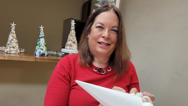 Tammy Blanton creates Christmas trees using seashells and sea glass.