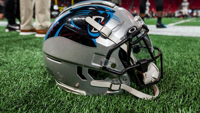 A Carolina Panthers helmet sits on the sideline before an NFL football game against the...