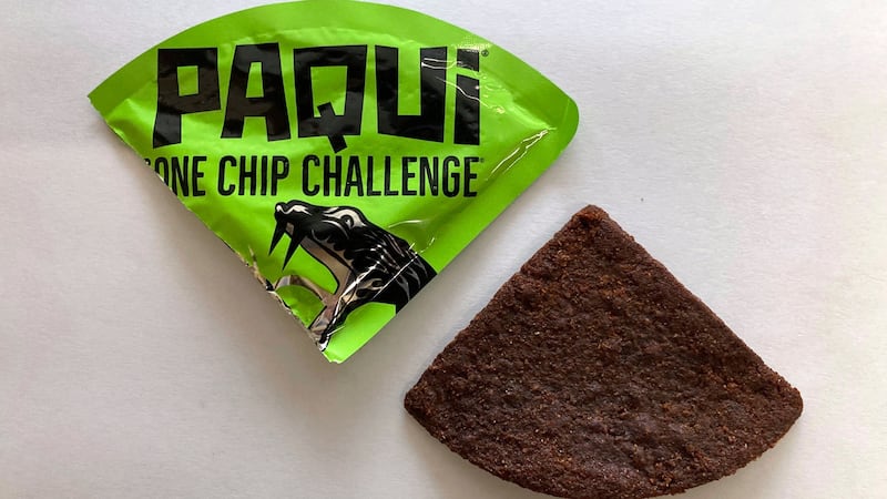 FILE - A Paqui One Chip Challenge chip is displayed in Boston, Friday, Sept. 8, 2023.  A...