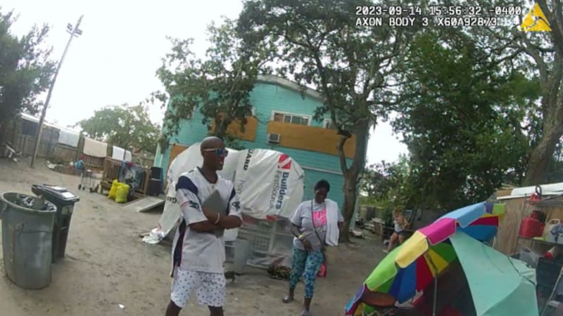 Pictures from police body camera footage shows the living conditions in the backyard of the...