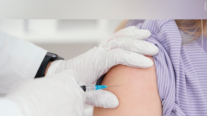 Child receiving a vaccine shot