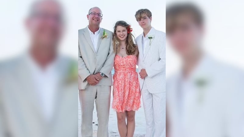 Baton Rouge Dr. Lucuis “Tre” Doucet is pictured with two of his three adult children, Giselle...