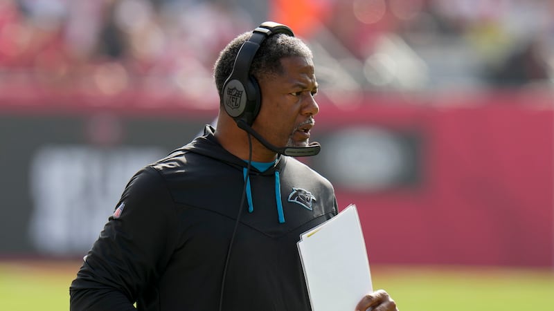 Carolina Panthers head coach Steve Wilks watches during the first half of an NFL football game...