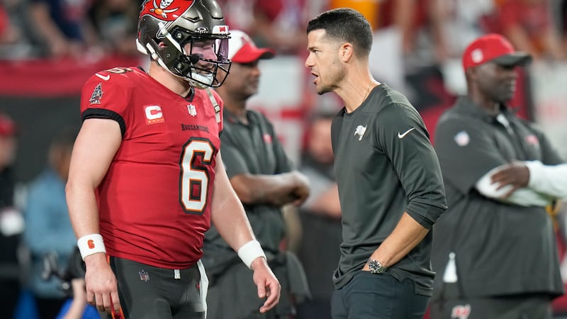 Tampa Bay Buccaneers quarterback Baker Mayfield (6) talks to offensive coordinator Dave...