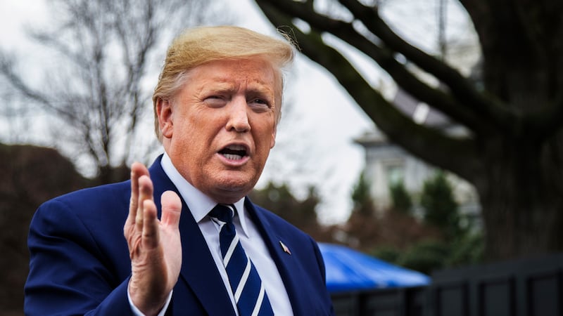 President Donald Trump speaks to members of the media before leaving the White House, Tuesday,...