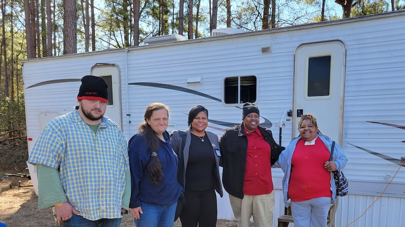 Neighbors Helping Neighbors lives up to its name by providing housing and other basic needs.