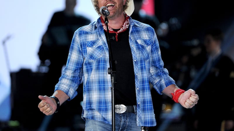 Toby Keith performs at ACM Presents an All-Star Salute to the Troops on Monday, April 7, 2014,...