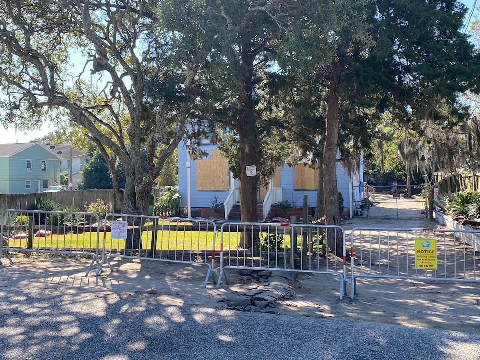 Myrtle Beach police put up barricades and boarded up the windows at the Yellow House along 5th...