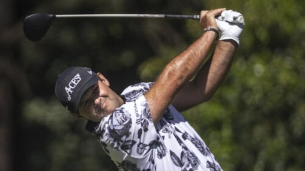 Masters champion Patrick Reed of the United States plays a stroke from the No. 11 tee during...