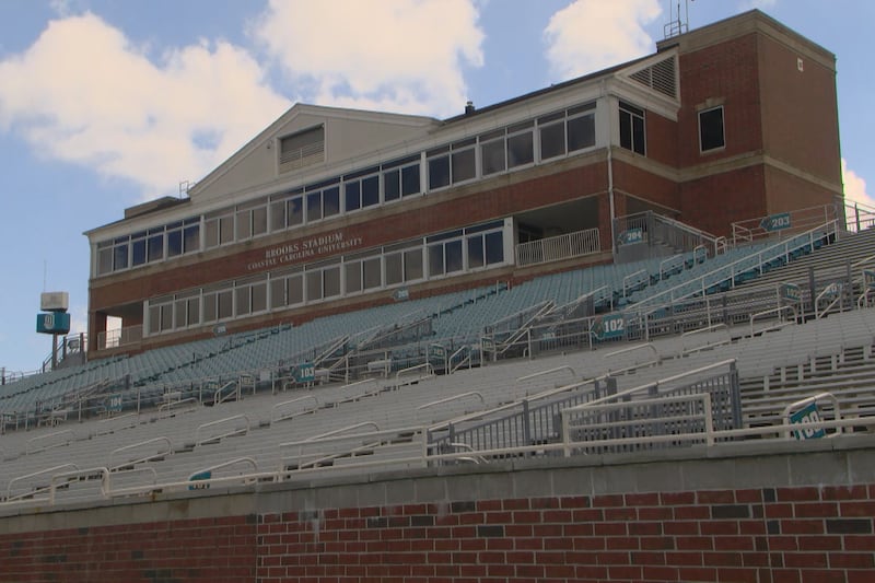 "Voice of the Chanticleers' Joe Cashion steps away from the mic.